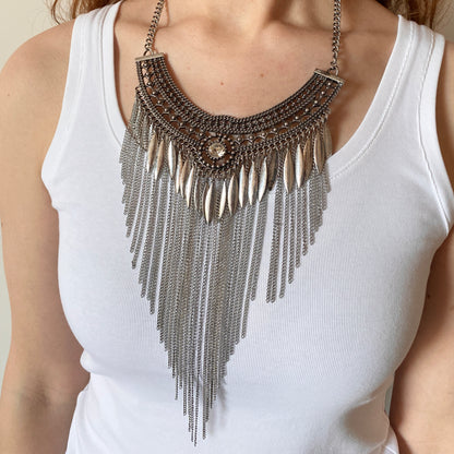 Metal necklace with a large crystal